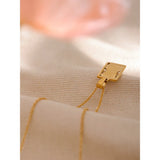 Figura | Women Necklace with Body Pendant and Gold Steel