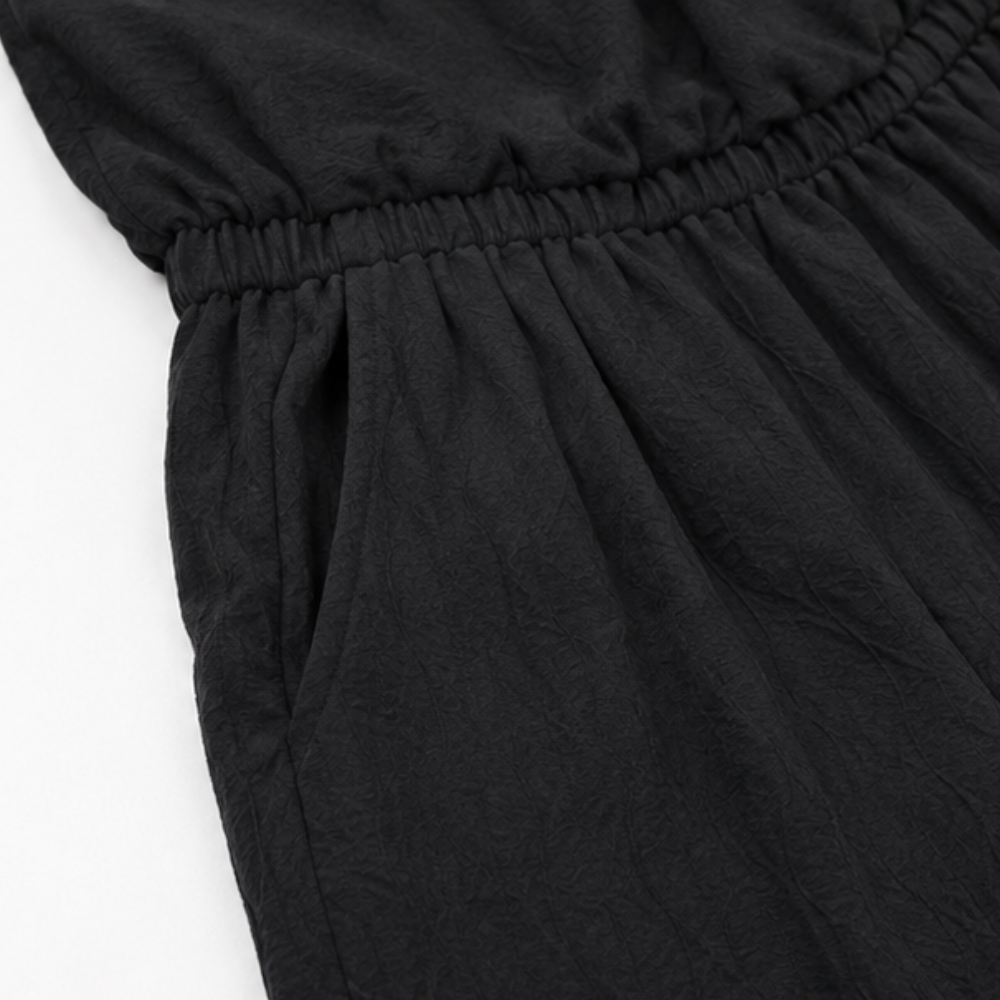Draplyn – The 2-Piece Halter That Skims, Not Swallows