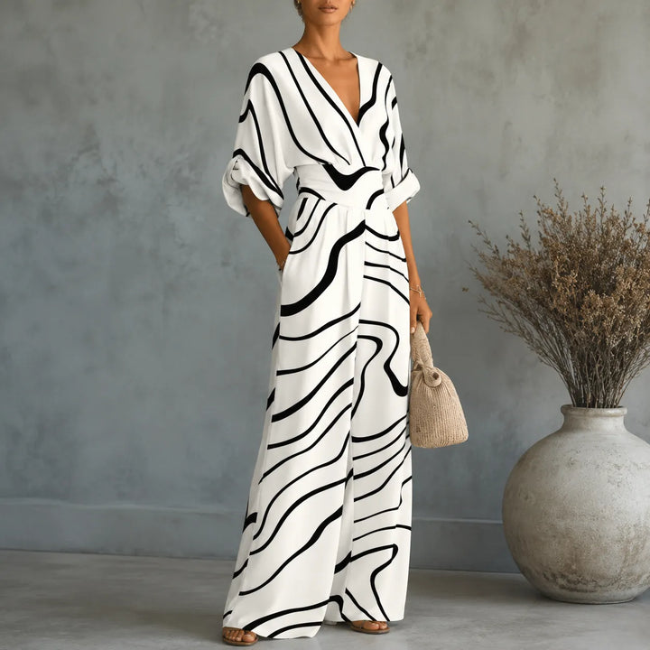 Solene – Printed V-Neck Wide-Leg Jumpsuit with Cinched Waist and Pockets