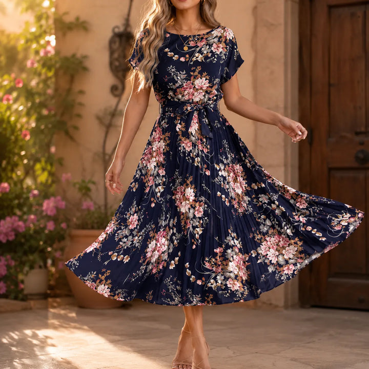 Florenza – Floral Pleated Midi Dress with Tie Waist and Flutter Sleeves